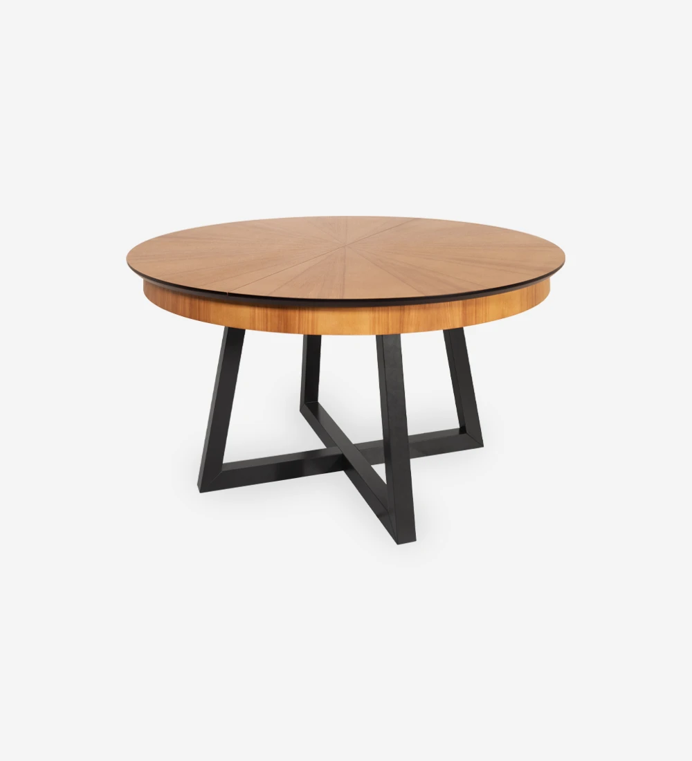 Round extendable dining table with honey oak top and black lacquered legs.