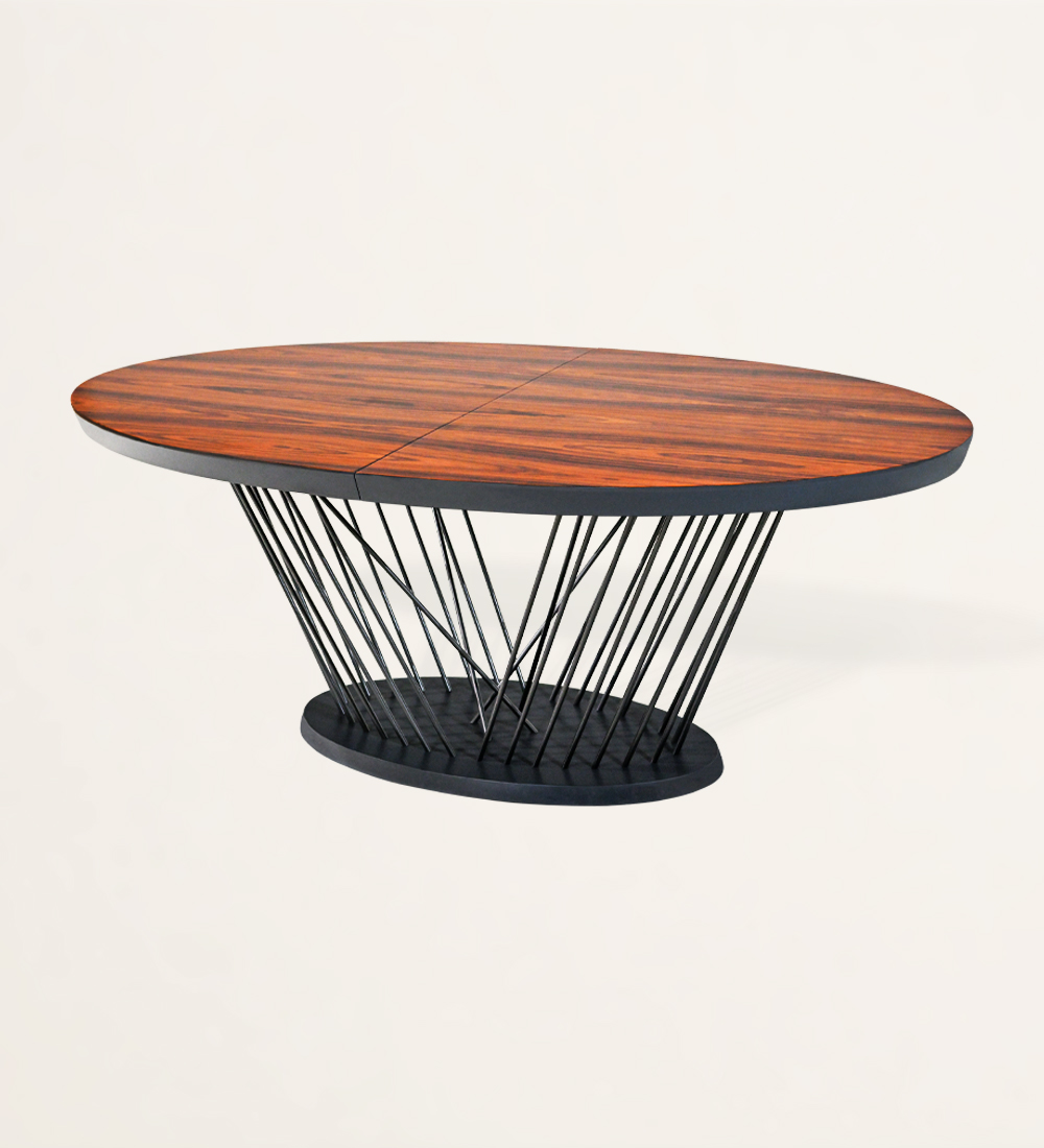 Oval extendable dining table with high gloss palissander top and black lacquered metal legs and base.
