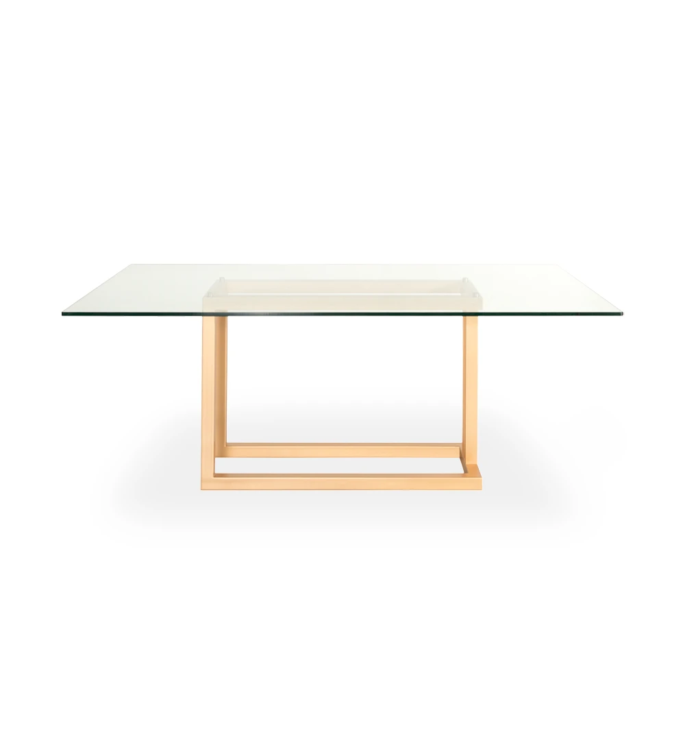 Mesa de jantar retangular com tampo de vidro e pé metálico lacado a dourado