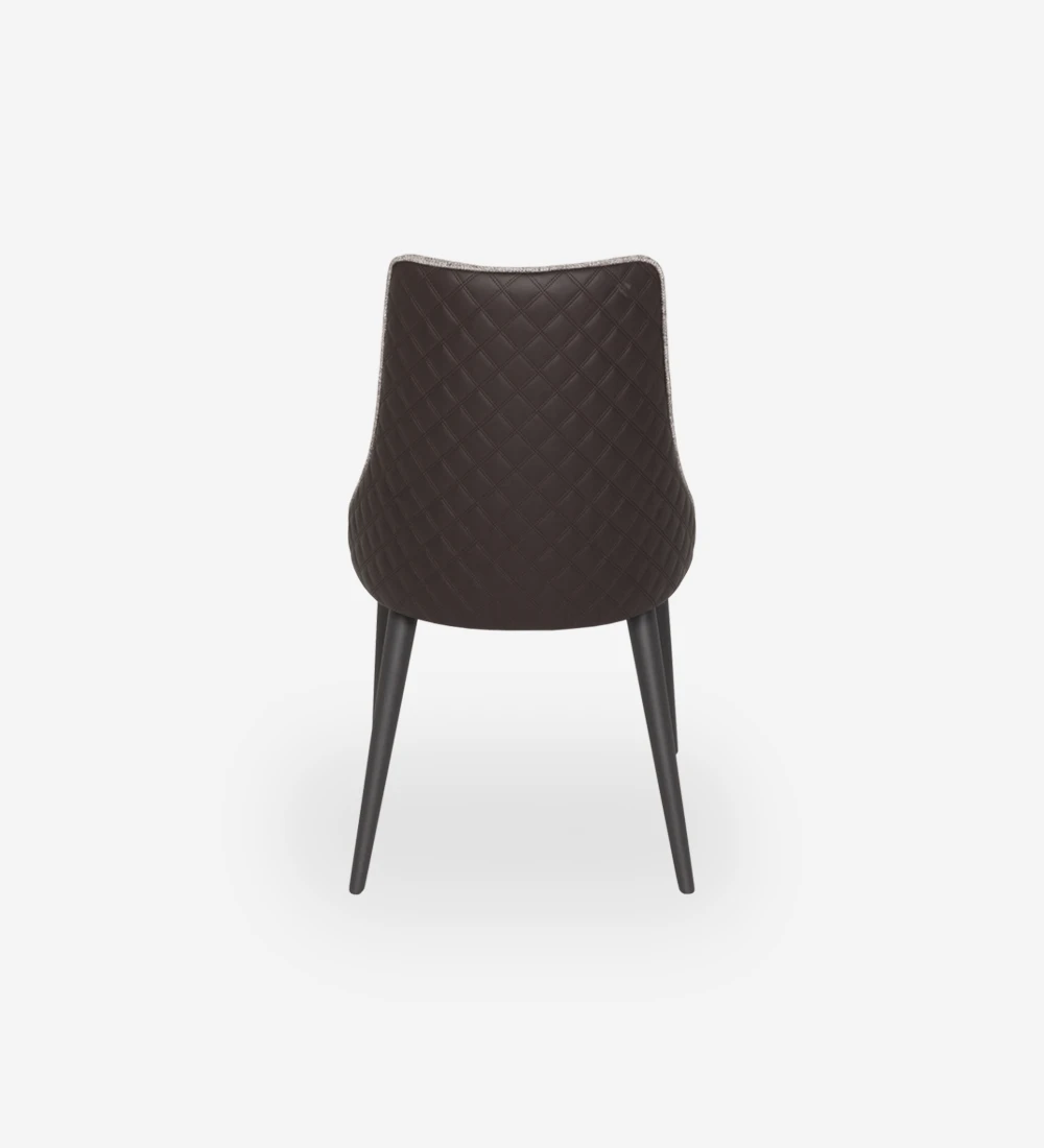 Fabric upholstered chair with black lacquered feet.