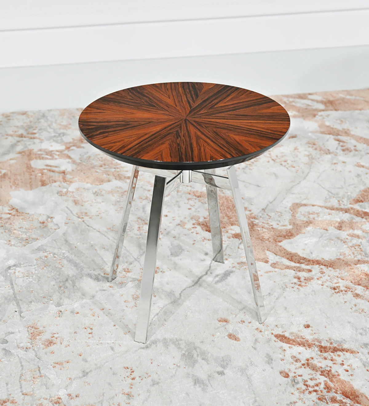 Table d'Appui ronde, avec plateau en palissandre brillant et pied en acier inoxydable.