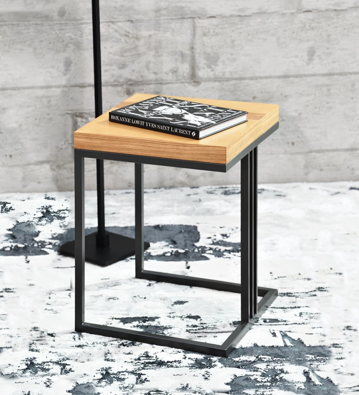 Square side table with honey oak top and black lacquered metallic foot.