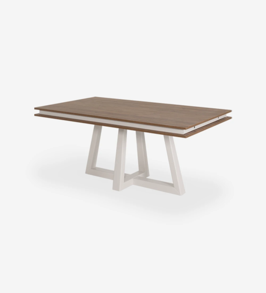 Rectangular extendable dining table with aged oak top, pearl lacquered center foot.
