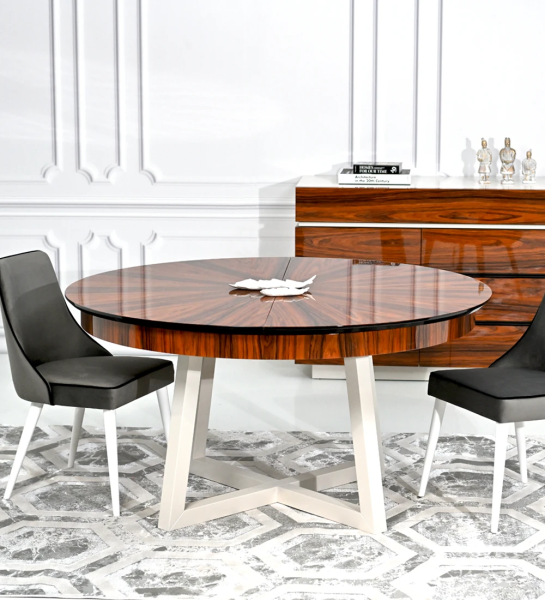 Round extendable dining table with top in high gloss palissander and pearl lacquered legs.