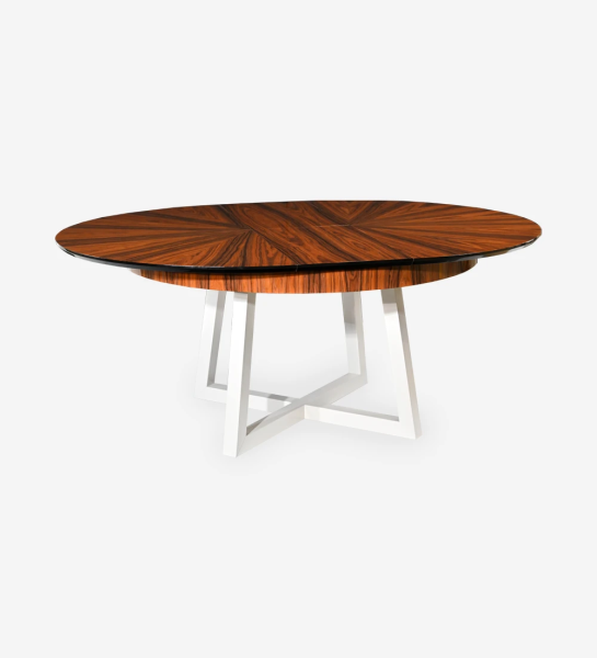 Round extendable dining table with top in high gloss palissander and pearl lacquered legs.