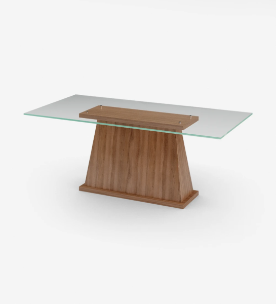 Rectangular dining table with glass top, center foot and walnut base.