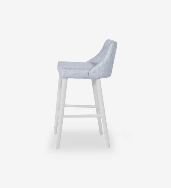 Oslo stool upholstered in light gray fabric, pearl lacquered feet, height 86,5 cm.