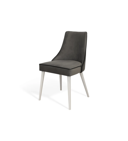 Fabric upholstered chair with pearl lacquered feet.