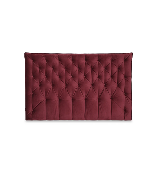 Headboard upholstered in fabric.