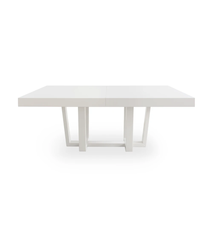 Mesa de comedor rectangular extensible con tablero y patas en lacado perla.