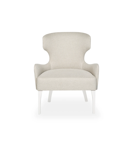 Pico armchair upholstered in beige fabric, gold studs, pearl lacquered feet.