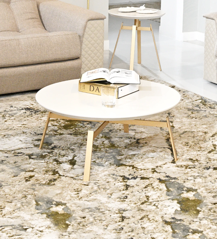 Round center table with pearl lacquered top and gold lacquered metallic foot