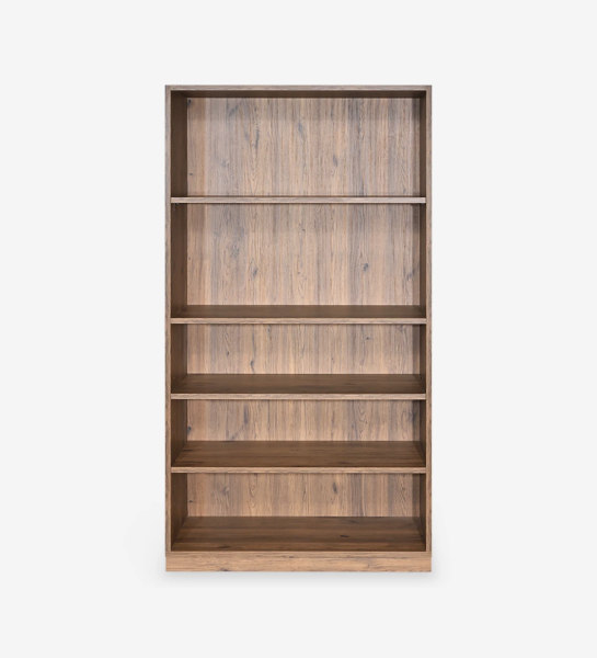 Low bookcase in aged oak, with removable shelves.